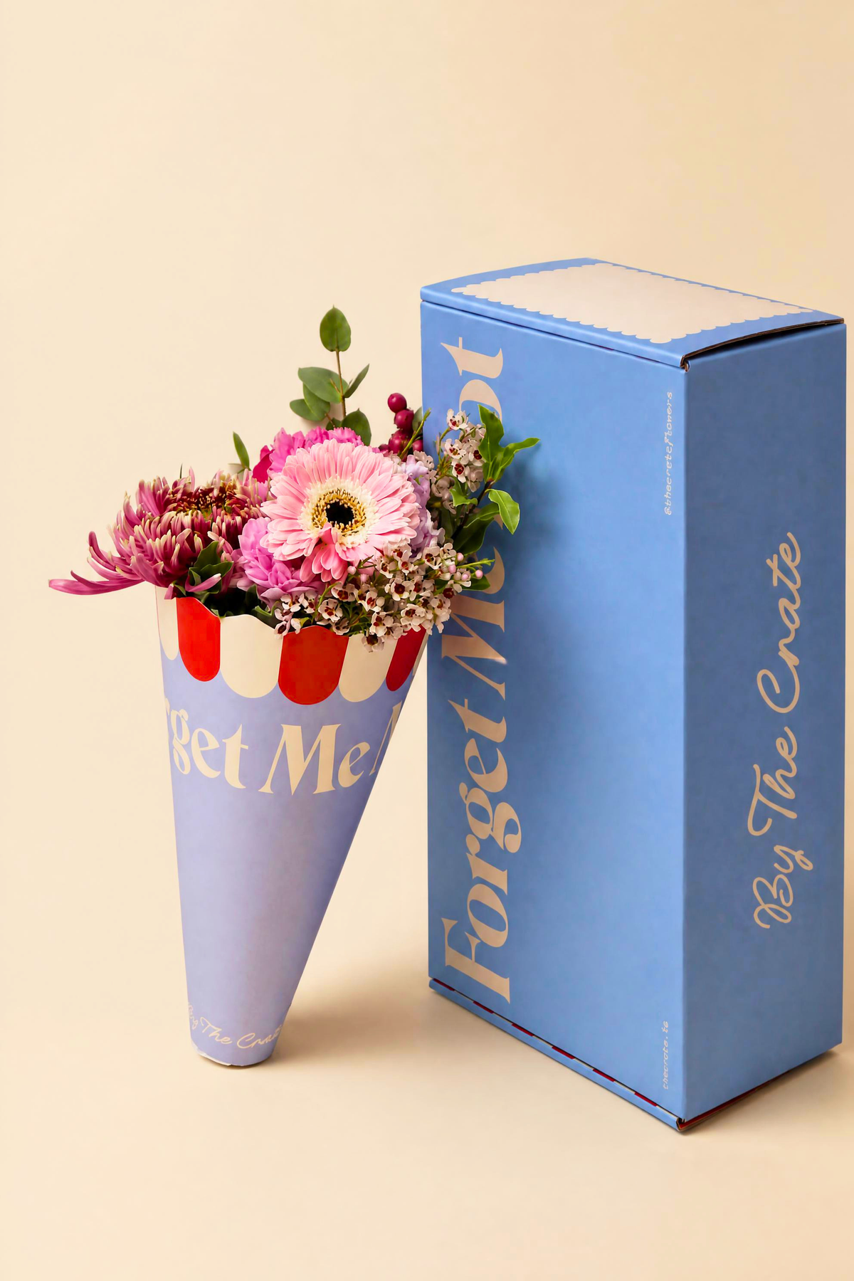 "Luxury pink gerbera daisy floral bouquet and blue presentation box ready for nationwide gift delivery."
