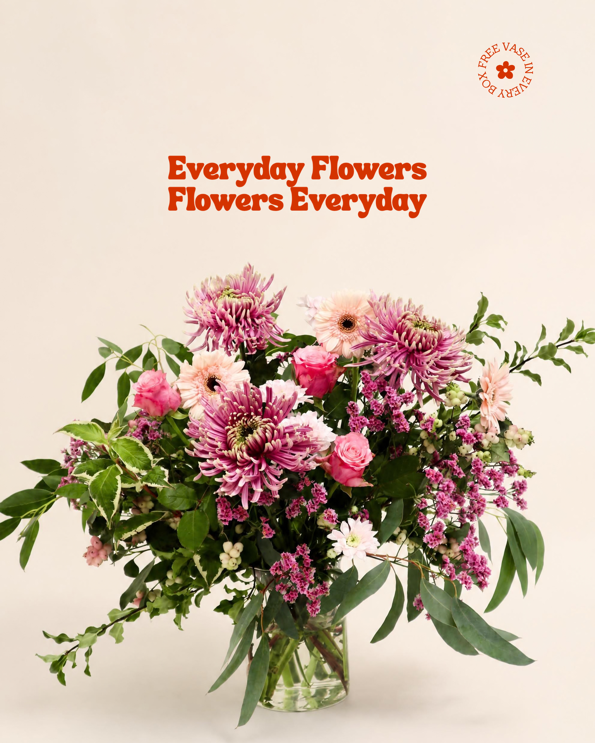 A vibrant flower bouquet in a clear glass vase, featuring pink and purple chrysanthemums, pink roses, green foliage, and small white daisies, set against a warm beige background with the text 'Everyday Flowers Flowers Everyday' and a 'Fresh Flowers Daily' logo.